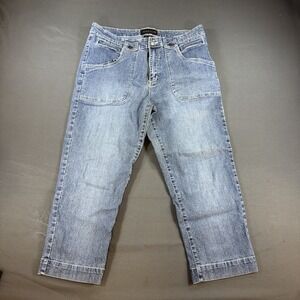 Adolfo medium-wash denim jeans featuring prominent front patch pockets Sz 14